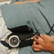 Odessa Johnson taking blood pressure